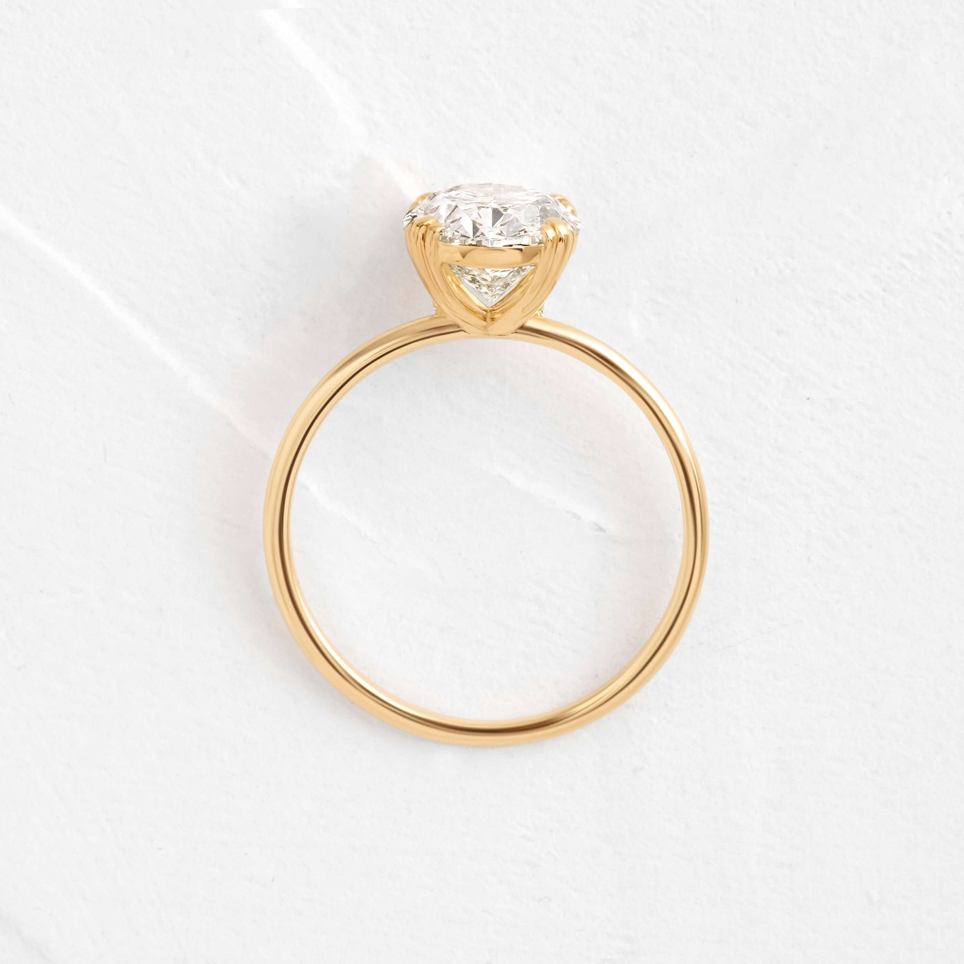 Solitaire Triple Prong with Hidden Stones-Oval Lab Grown Diamond Engagement Ring - Back view