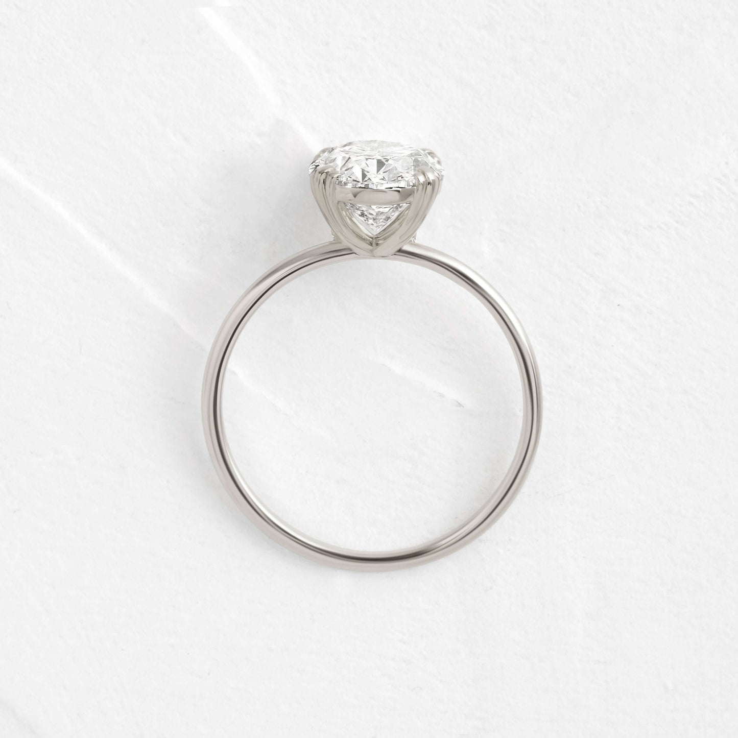 Solitaire Triple Prong with Hidden Stones-Oval Lab Grown Diamond Engagement Ring - Front view