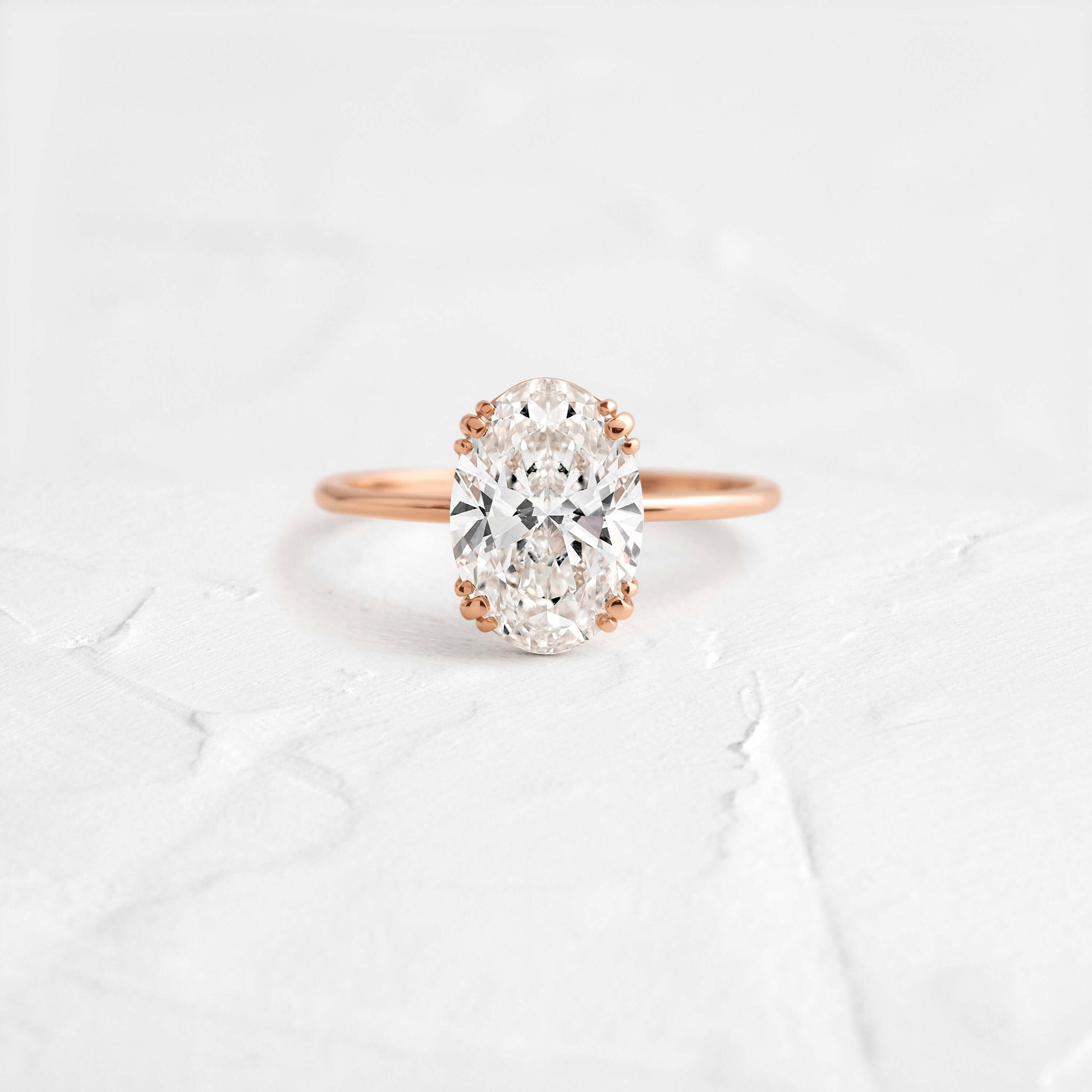 Solitaire Triple Prong with Hidden Stones-Oval Lab Grown Diamond Engagement Ring - Side view