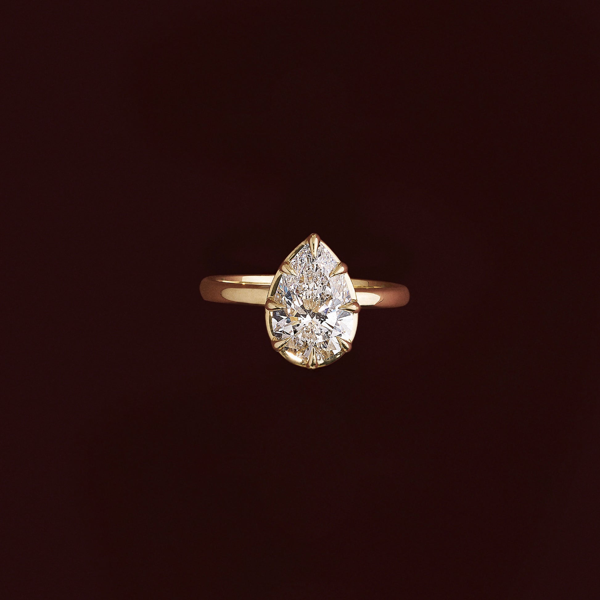 Solitaire Unique Bezel- 2.1 CT Pear Moissanite Engagement RingSolitaire Unique Bezel- 2.1 CT Pear Moissanite Engagement Ring - Side view