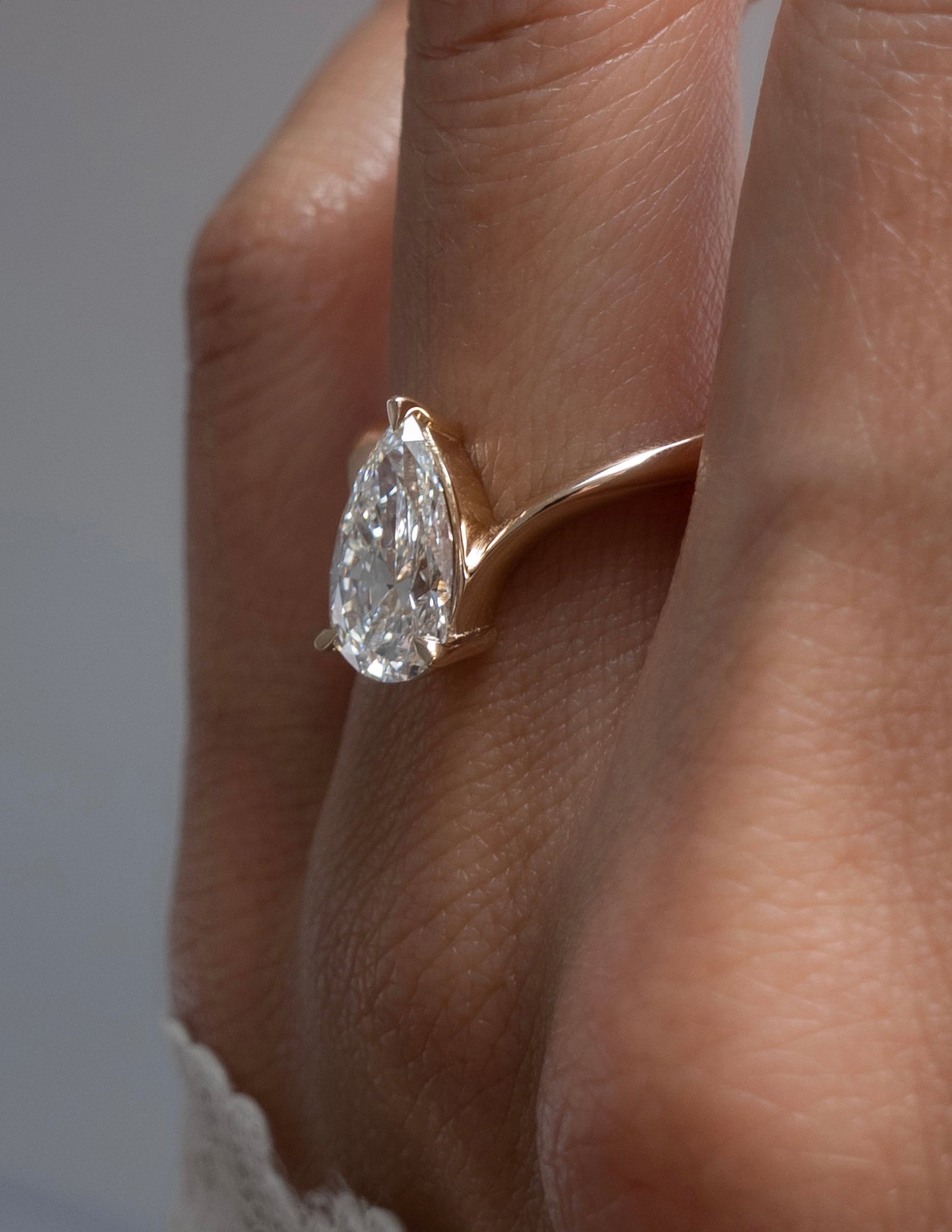 Solitaire V Curved Shank-Pear Lab Grown Diamond Engagement Ring - Detail view