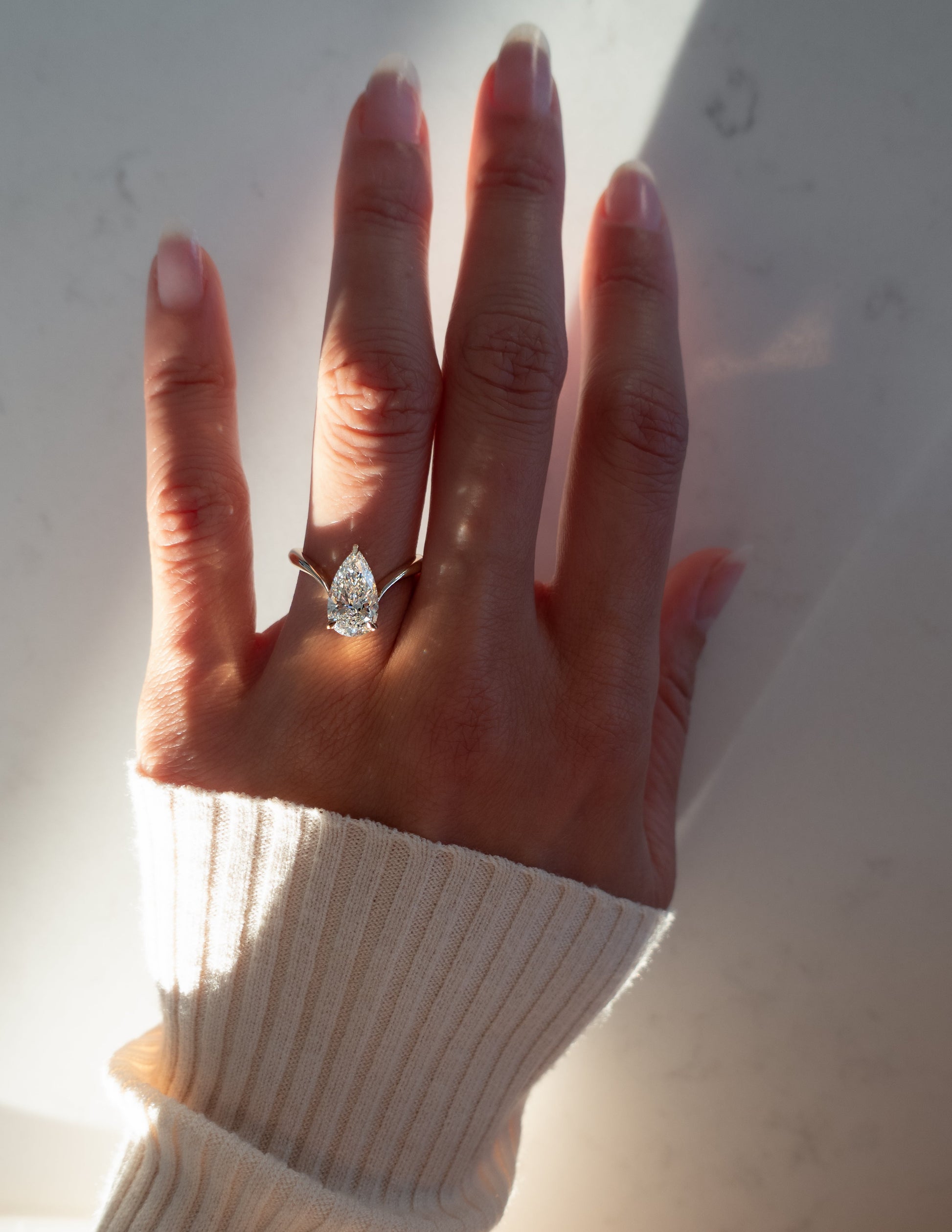 Solitaire V Curved Shank-Pear Lab Grown Diamond Engagement Ring - Side view