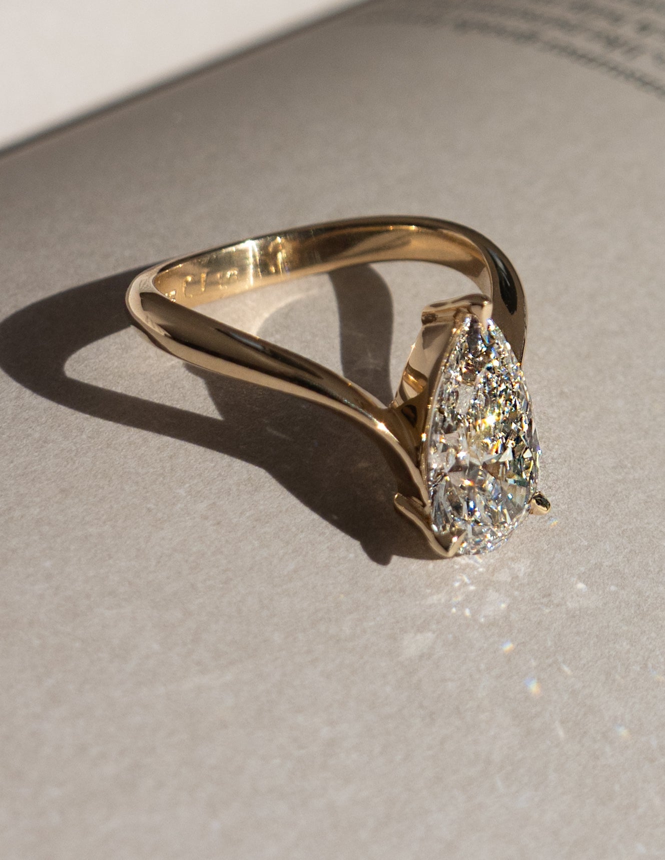 Solitaire V Curved Shank-Pear Lab Grown Diamond Engagement Ring - Front view