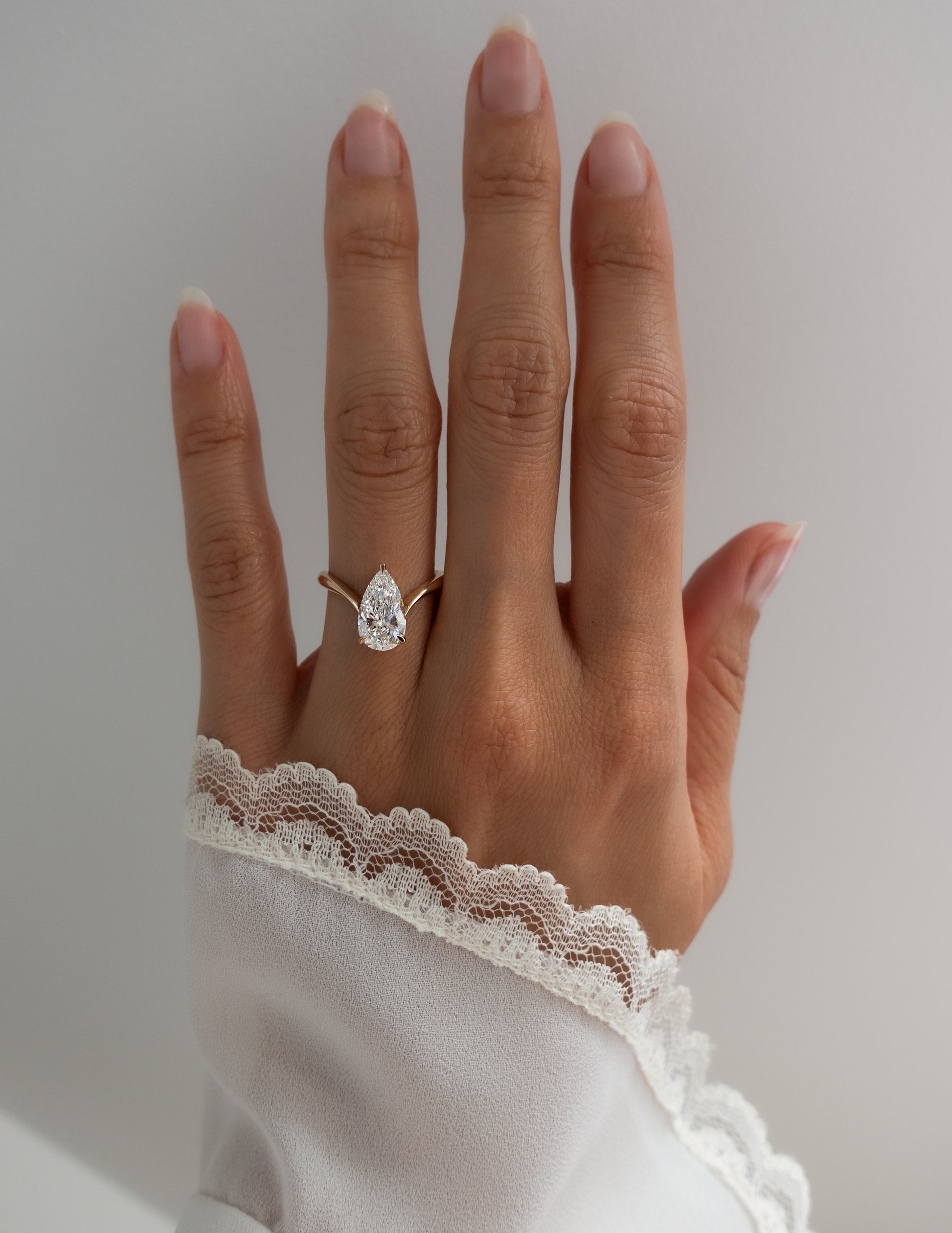 Solitaire V Curved Shank-Pear Lab Grown Diamond Engagement Ring - Lifestyle