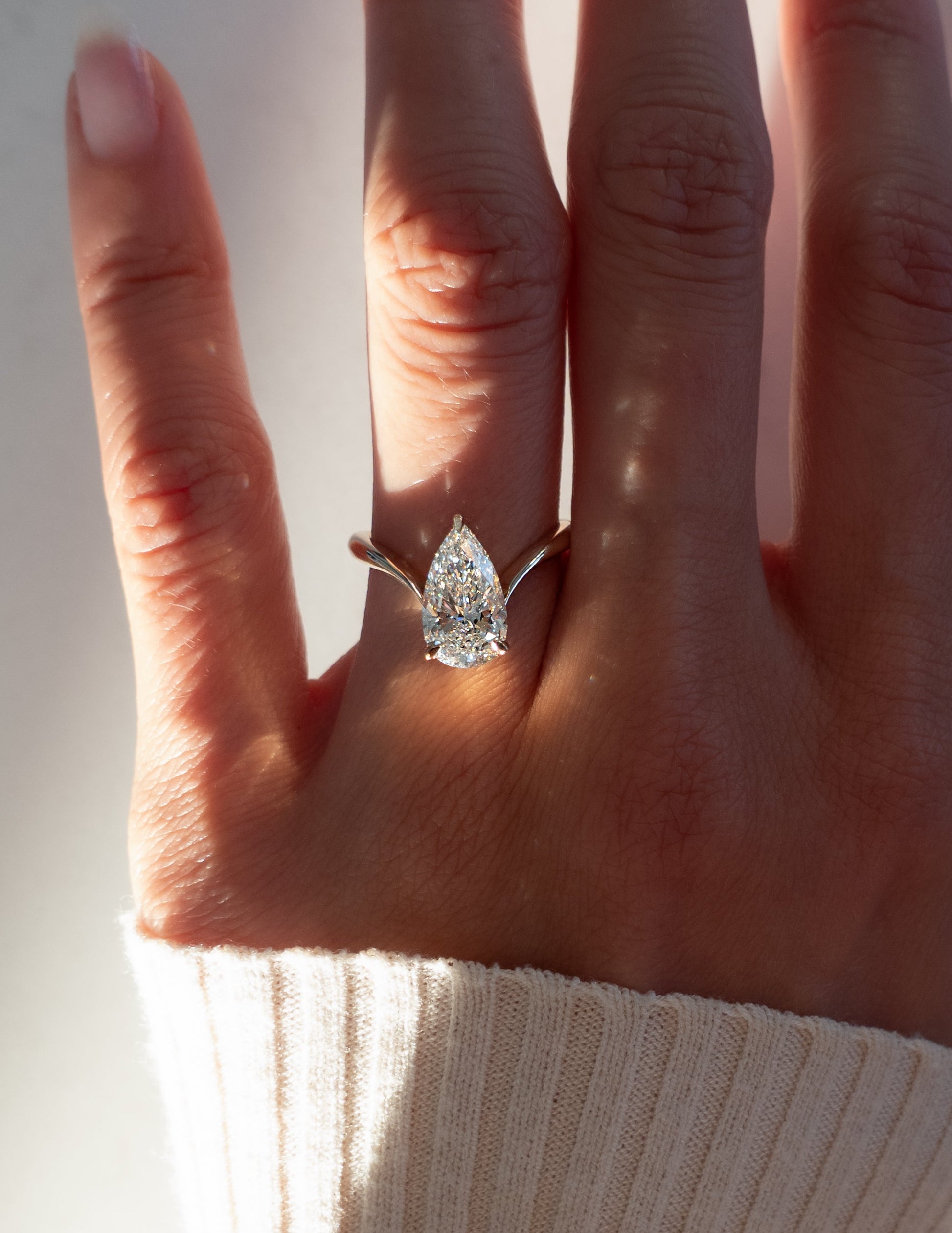 Solitaire V Curved Shank-Pear Lab Grown Diamond Engagement Ring - Side view