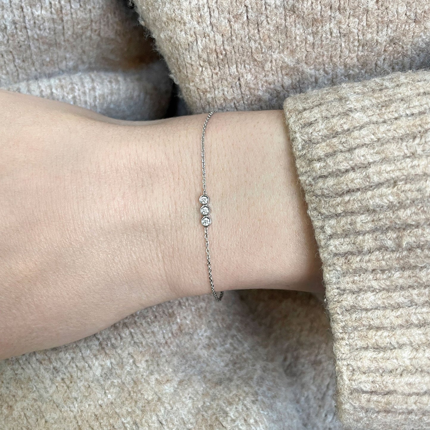 Three Stone Bezel-0.3 CT Round Lab Grown Diamond BraceletsThree Stone Bezel-0.3 CT Round Lab Grown Diamond Bracelets - On model