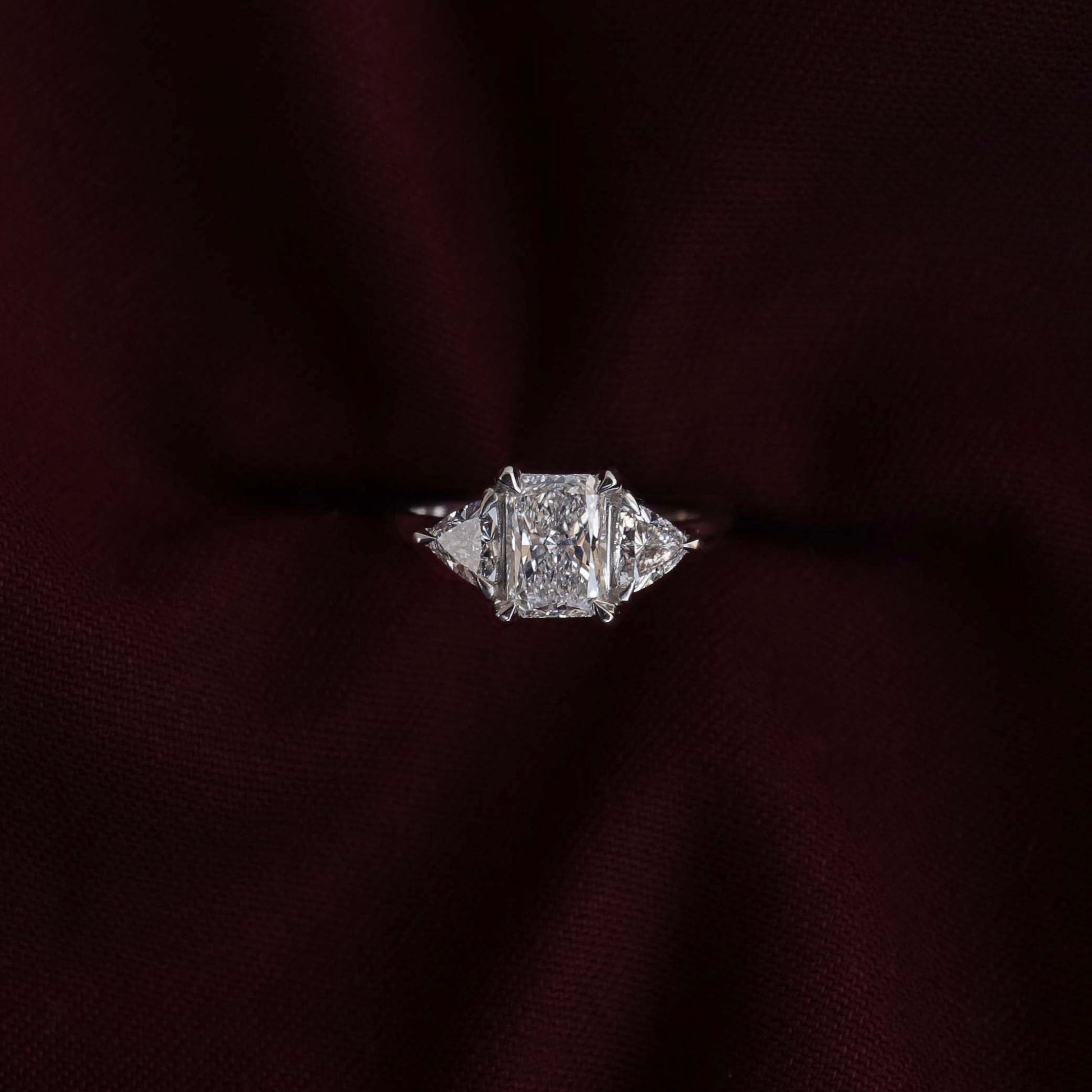 Three Stone Cathedral- 1.65 CT Radiant Moissanite Engagement RingThree Stone Cathedral- 1.65 CT Radiant Moissanite Engagement Ring - Side view