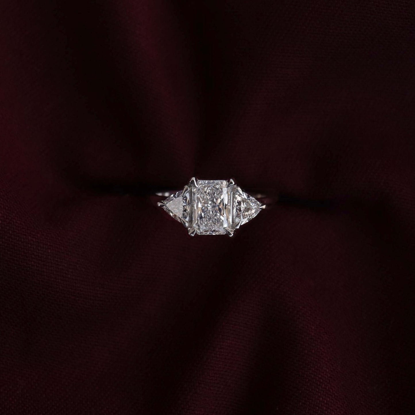 Three Stone Cathedral- 1.65 CT Radiant Moissanite Engagement RingThree Stone Cathedral- 1.65 CT Radiant Moissanite Engagement Ring - Side view