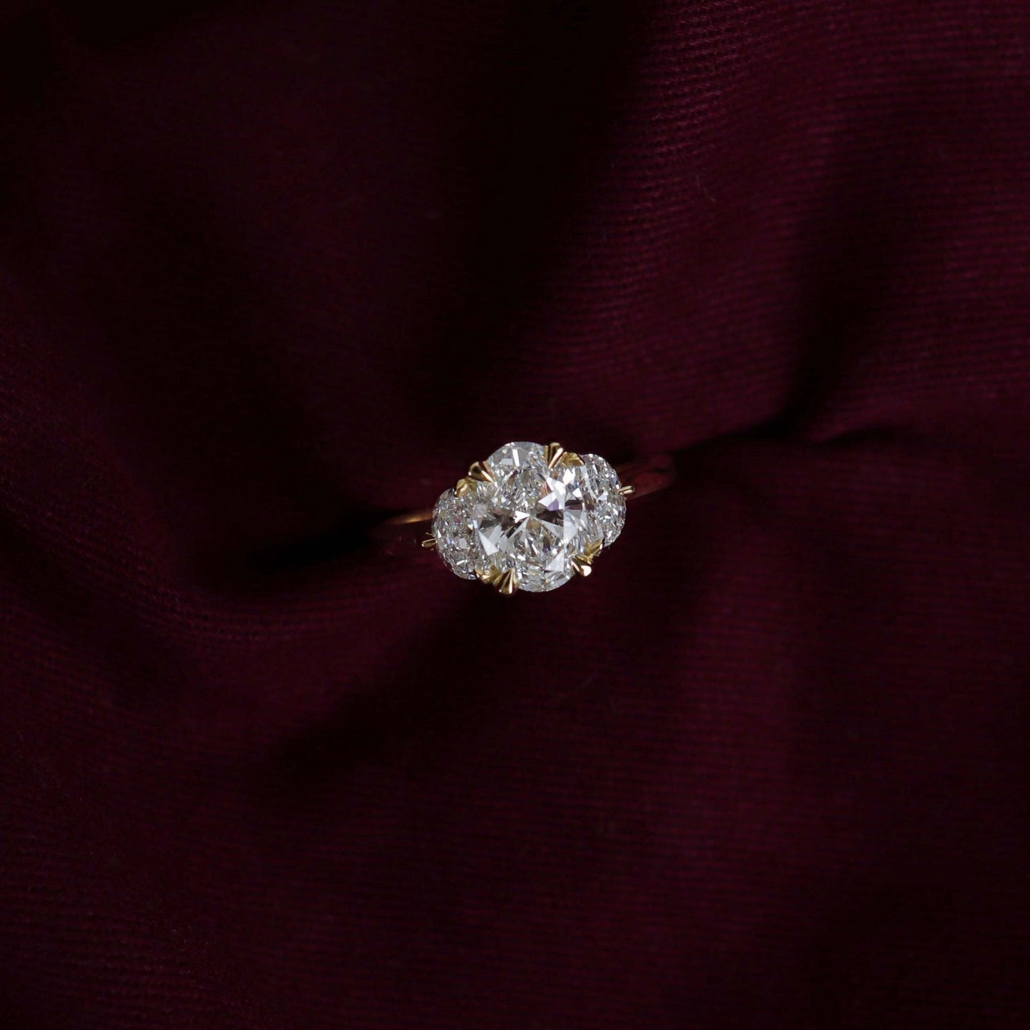Three Stone Cathedral- 1.7 CT Oval Moissanite Engagement RingThree Stone Cathedral- 1.7 CT Oval Moissanite Engagement Ring - Side view
