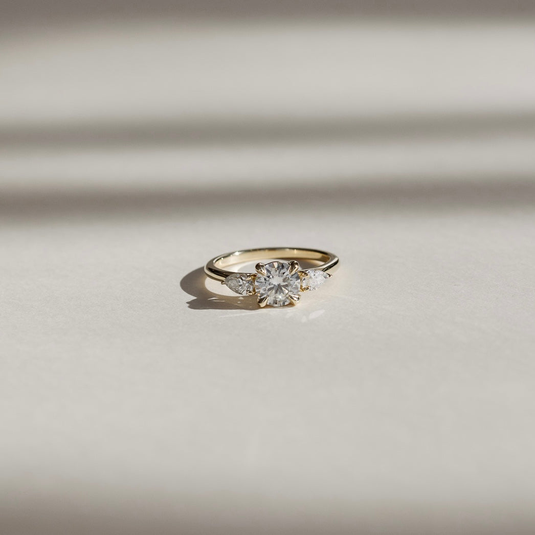Three Stone Cathedral- 1.8 CT Round Moissanite Engagement RingThree Stone Cathedral- 1.8 CT Round Moissanite Engagement Ring - Side view
