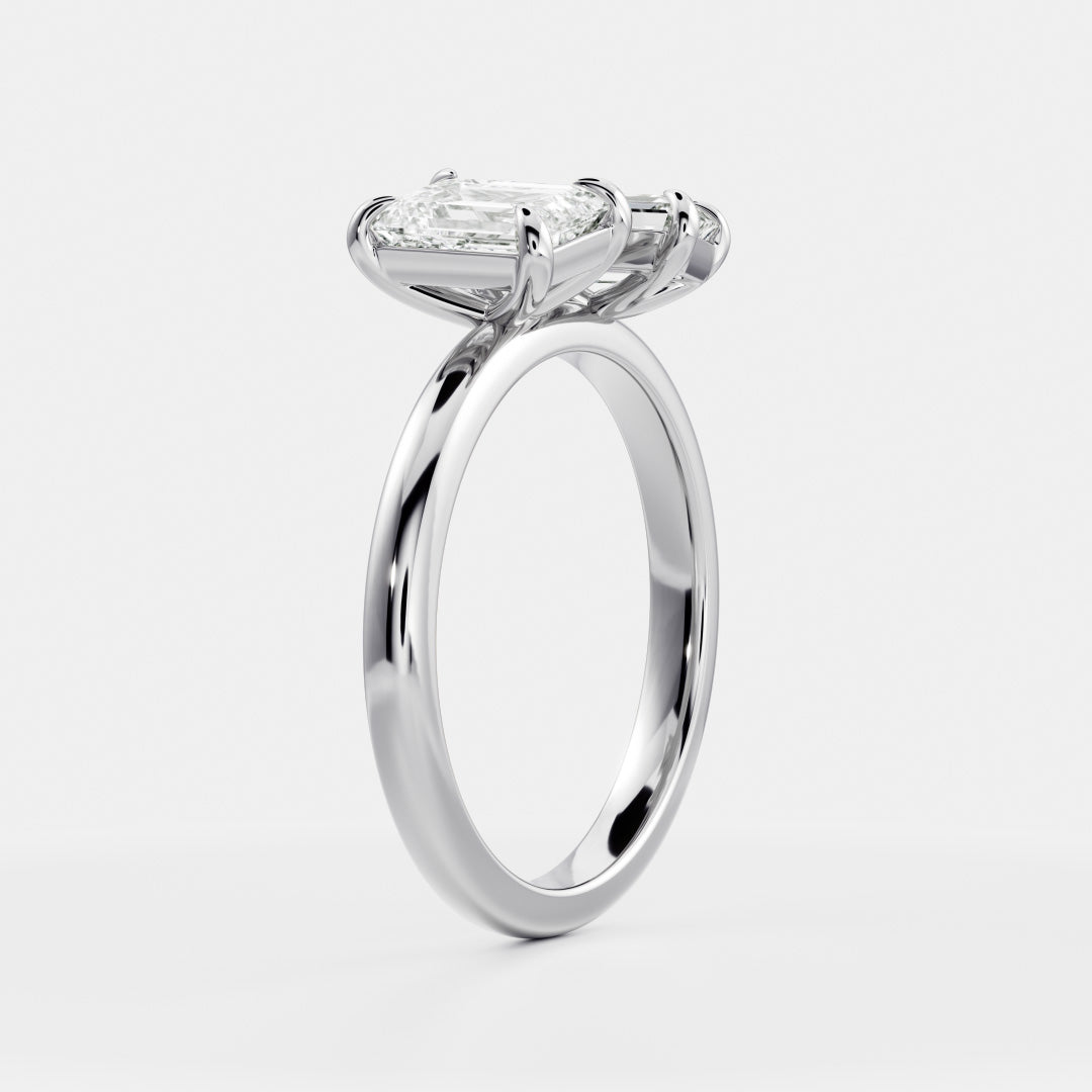 Toi Et Moi- 1.0 CT Emerald & 0.6 CT Emerald Moissanite Engagement RingToi Et Moi- 1.0 CT Emerald & 0.6 CT Emerald Moissanite Engagement Ring - Lifestyle
