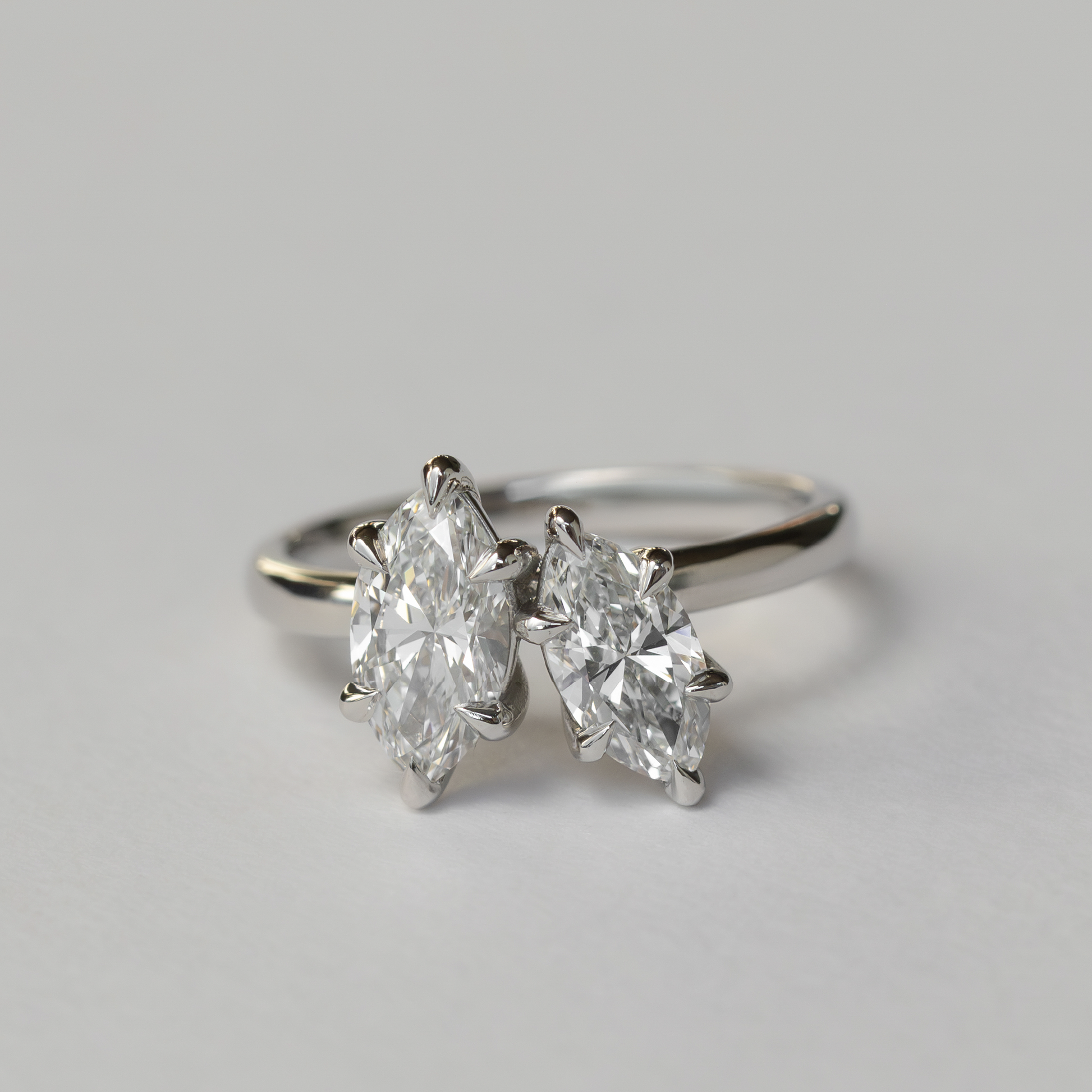 Toi Et Moi- 1.1 CT Marquise & 0.75 CT Marquise Moissanite Engagement RingToi Et Moi- 1.1 CT Marquise & 0.75 CT Marquise Moissanite Engagement Ring - Side view