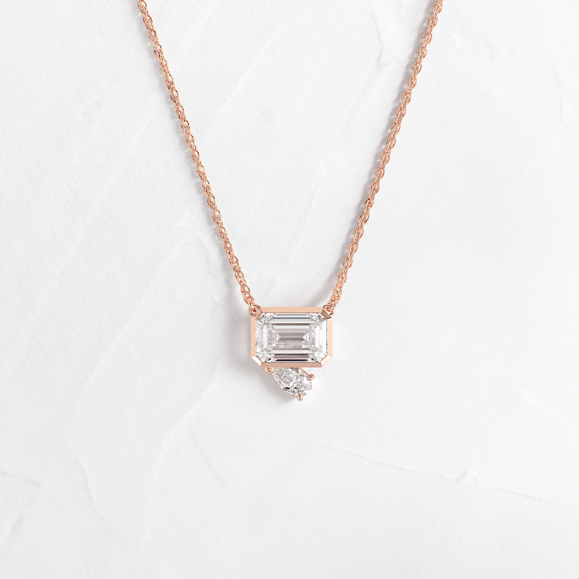 Toi Et Moi- 1.75 CT Emerald & Pear Lab Grown Diamond NecklaceToi Et Moi- 1.75 CT Emerald & Pear Lab Grown Diamond Necklace - On model
