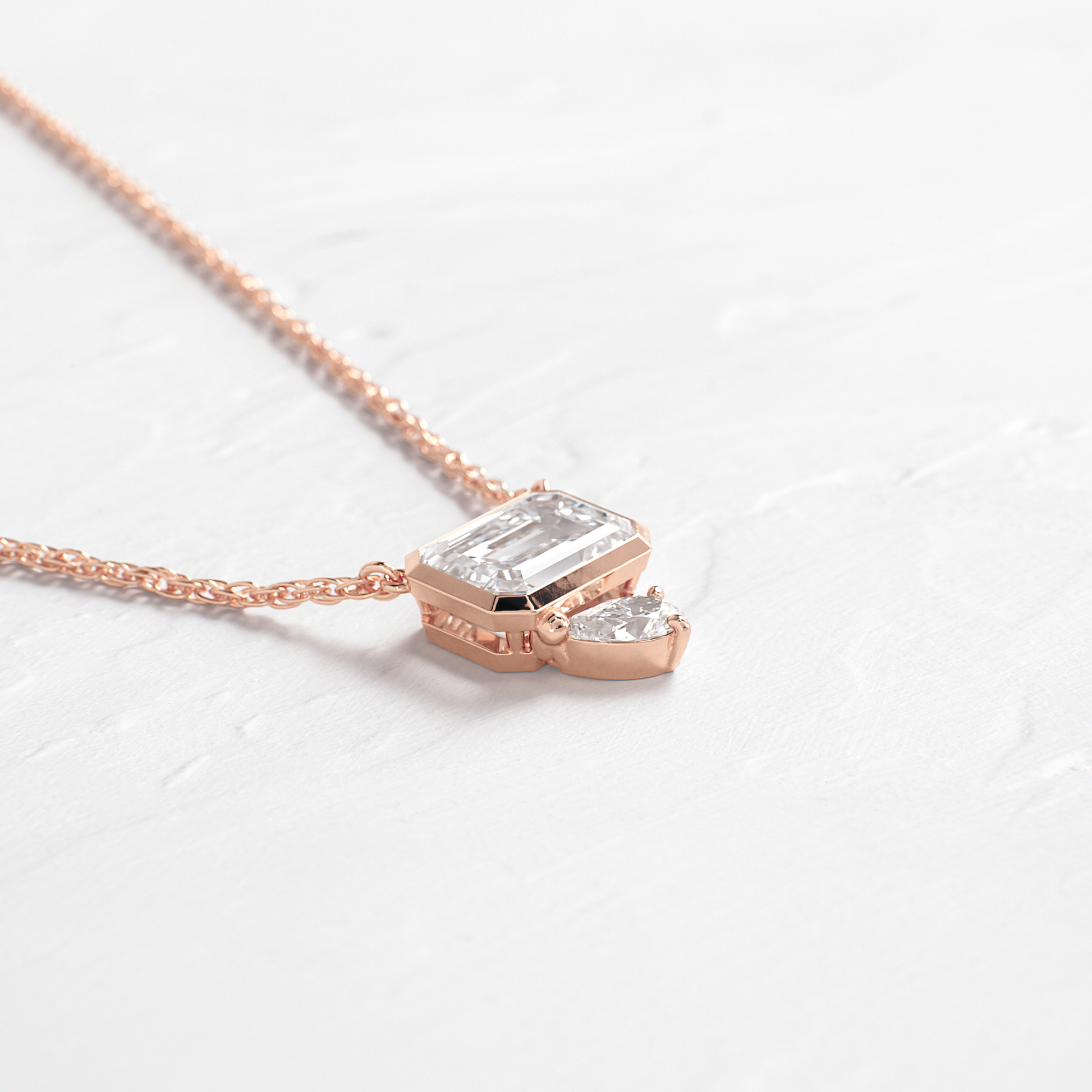 Toi Et Moi- 1.75 CT Emerald & Pear Lab Grown Diamond NecklaceToi Et Moi- 1.75 CT Emerald & Pear Lab Grown Diamond Necklace - Lifestyle
