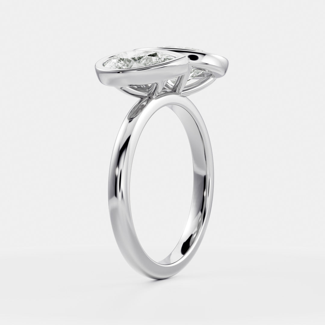 Toi Et Moi Bezel- 1.5 CT Oval & 0.85 CT Pear Moissanite Engagement RingToi Et Moi Bezel- 1.5 CT Oval & 0.85 CT Pear Moissanite Engagement Ring - On model