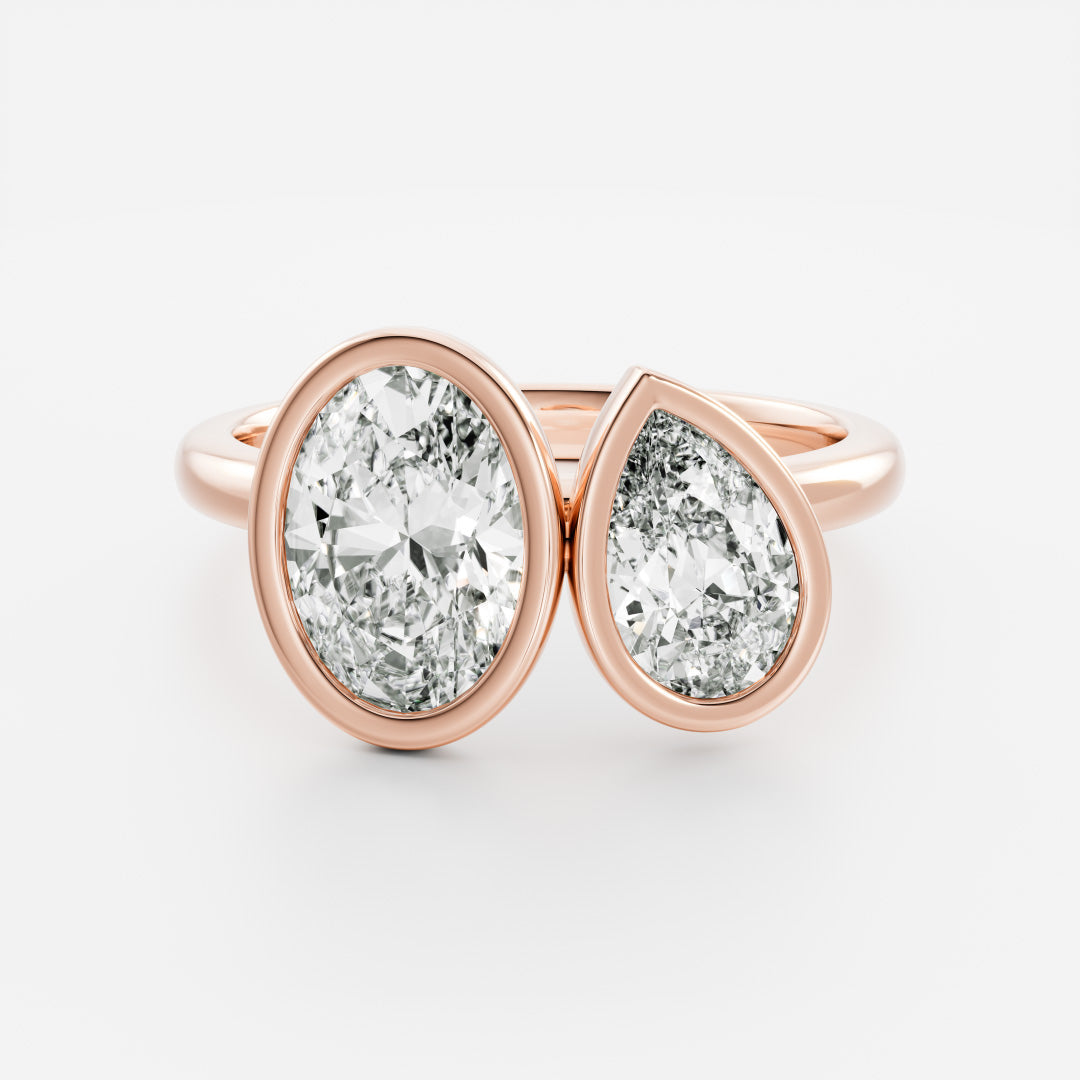 Toi Et Moi Bezel- 1.5 CT Oval & 0.85 CT Pear Moissanite Engagement RingToi Et Moi Bezel- 1.5 CT Oval & 0.85 CT Pear Moissanite Engagement Ring - Lifestyle