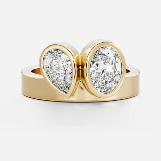 Toi Et Moi Bezel Cigar Band- 1.33 CT Pear & 1.5 CT Oval Moissanite Engagement RingToi Et Moi Bezel Cigar Band- 1.33 CT Pear & 1.5 CT Oval Moissanite Engagement Ring - Front view