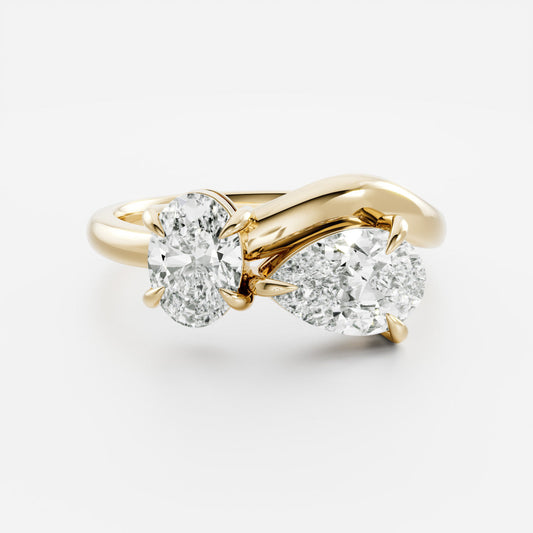 Toi Et Moi Curved- 1.25 CT Pear 0.95 CT Oval Moissanite Engagement RingToi Et Moi Curved- 1.25 CT Pear 0.95 CT Oval Moissanite Engagement Ring - Front view