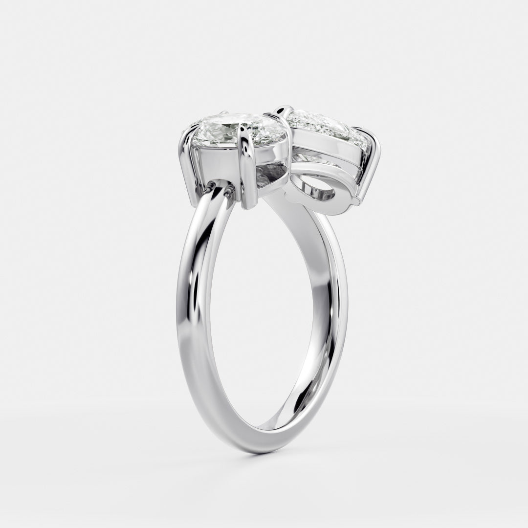 Toi Et Moi Curved- 1.25 CT Pear 0.95 CT Oval Moissanite Engagement RingToi Et Moi Curved- 1.25 CT Pear 0.95 CT Oval Moissanite Engagement Ring - Lifestyle