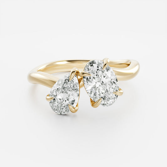 Toi Et Moi Curved- 1.3 CT Oval & 0.85 CT Pear Moissanite Engagement RingToi Et Moi Curved- 1.3 CT Oval & 0.85 CT Pear Moissanite Engagement Ring - Front view