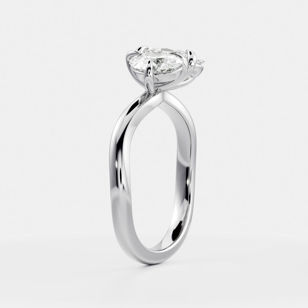 Toi Et Moi Curved- 1.3 CT Oval & 0.85 CT Pear Moissanite Engagement RingToi Et Moi Curved- 1.3 CT Oval & 0.85 CT Pear Moissanite Engagement Ring - On model