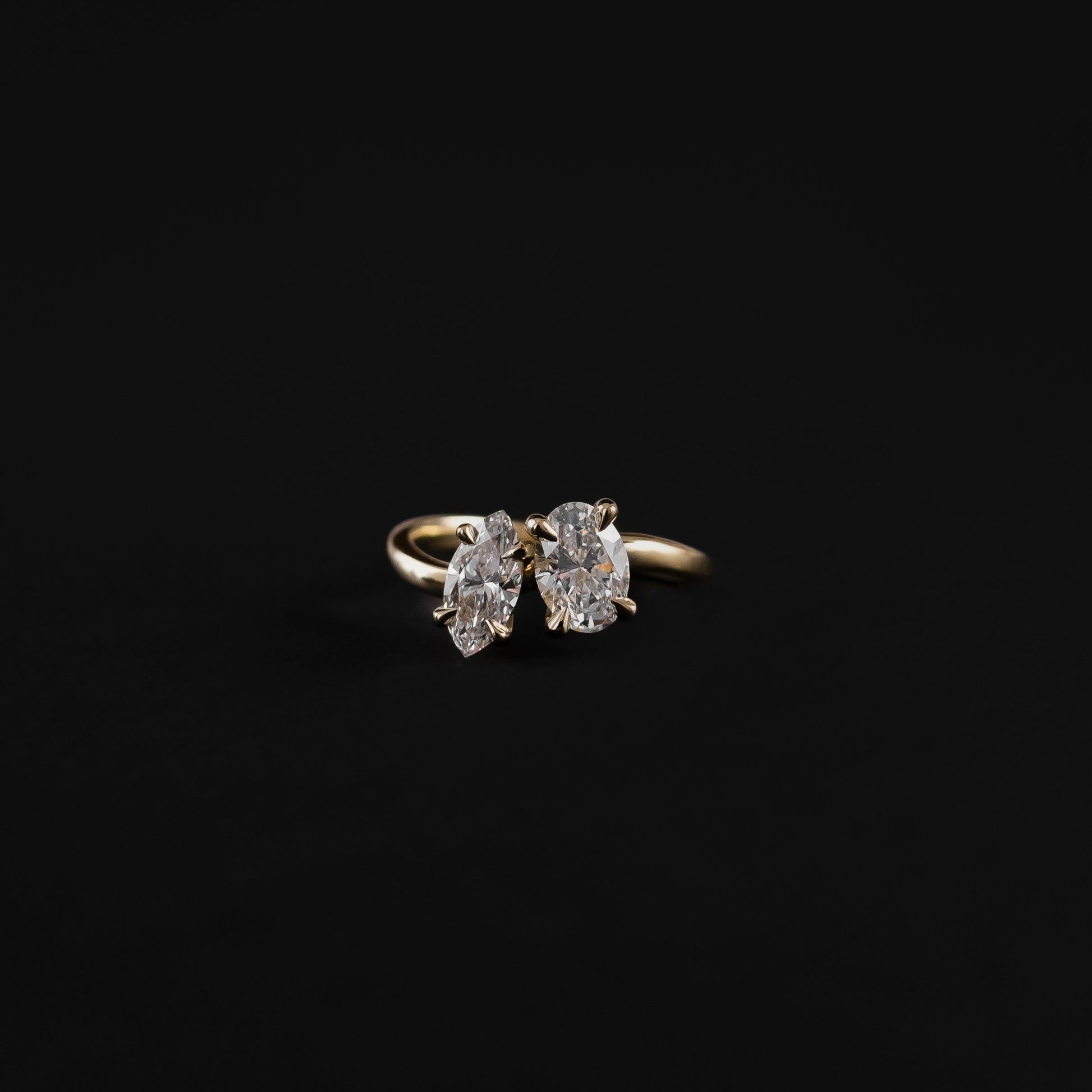 Toi Et Moi Curved- 1.55 CT Oval & 1.0 CT Marquise Moissanite Engagement RingToi Et Moi Curved- 1.55 CT Oval & 1.0 CT Marquise Moissanite Engagement Ring - Side view